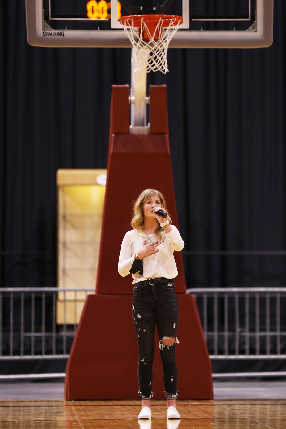 Alivia Hatch performs the National Anthem